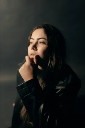 Pensive Woman In Dark