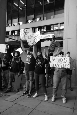 Protesters Holding Signs