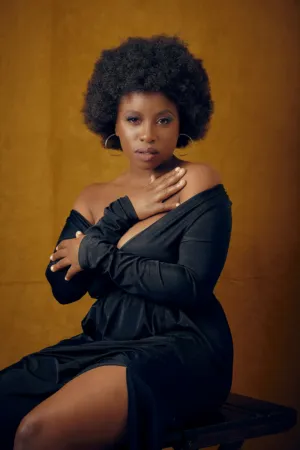Black Woman In Black Dress