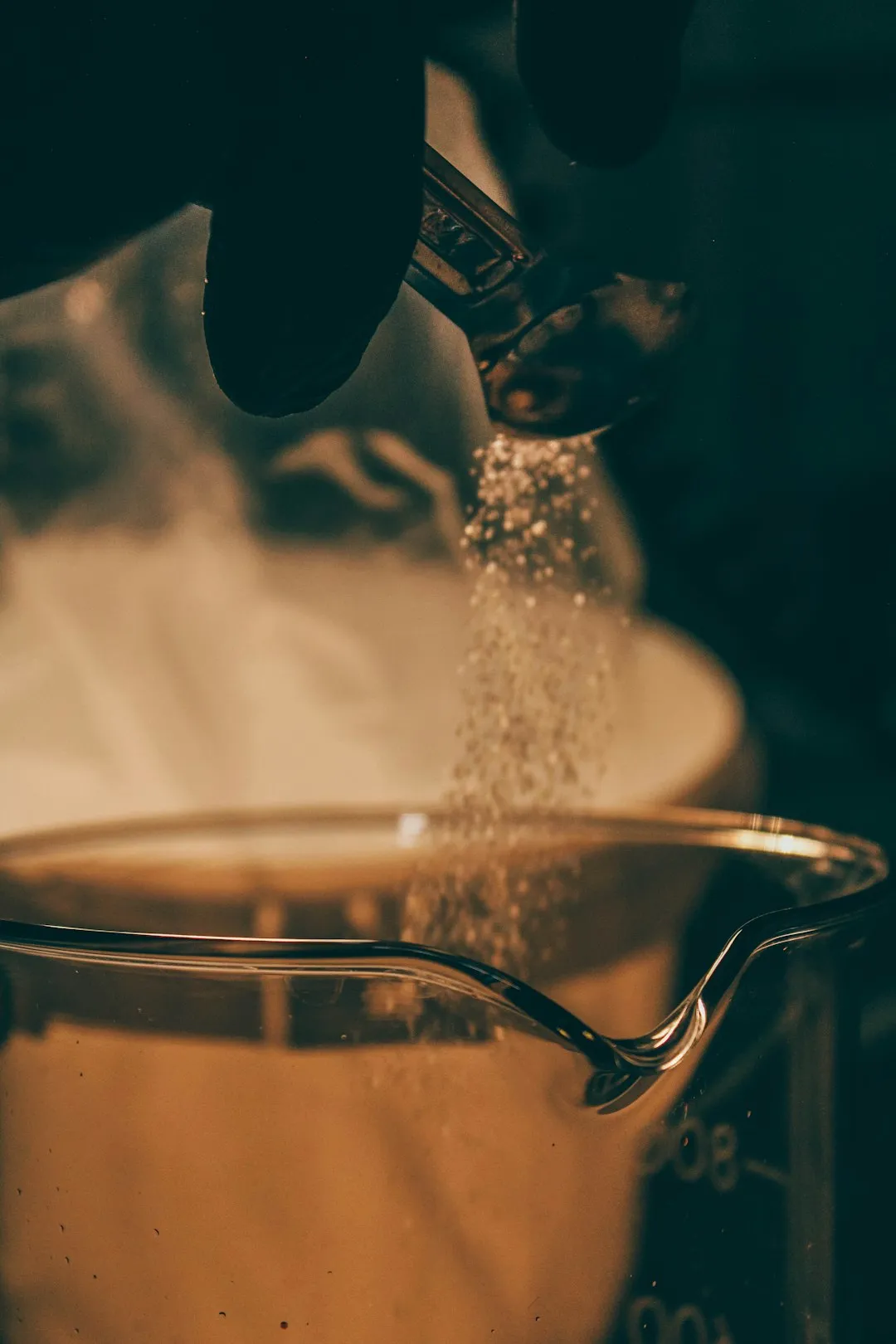 Sugar Pouring Into Beaker