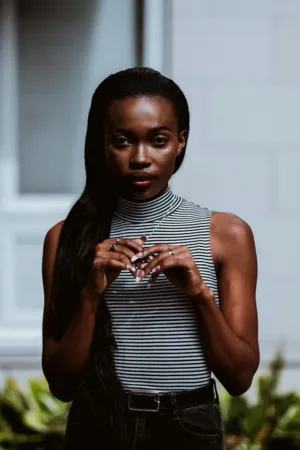 Black Woman In Striped Top
