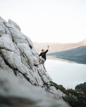 Climber On A Rocky Cliff