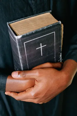 Holding A Bible