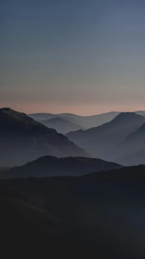 Silhouetted Mountains At Dusk