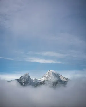 Mountain Peaks In The Clouds