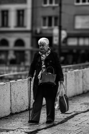Senior Woman Walking With Cane