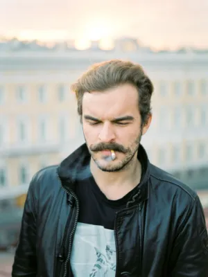 Man With Mustache Smoking Cigarette