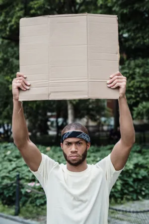 Protestor Holding Blank Sign