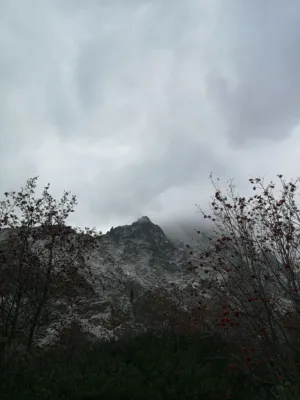 Mountain Peak In Clouds