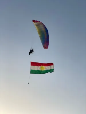 Paraglider With Kurdish Flag