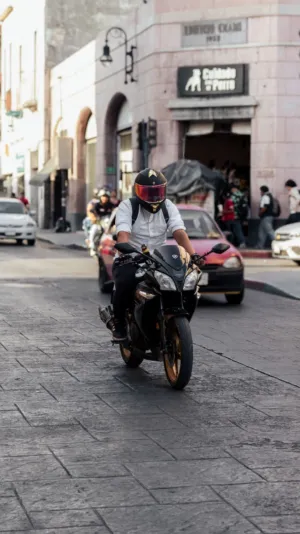 Motorcycle Rider In Urban Setting