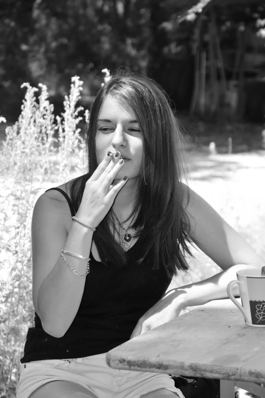 Young Woman Smoking Outdoors