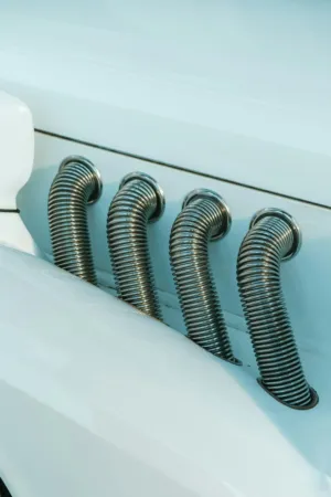 Spiral Hoses On A White Surface