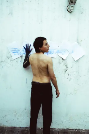 Man With Painted Hand