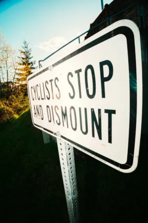 Cyclists Stop And Dismount Sign