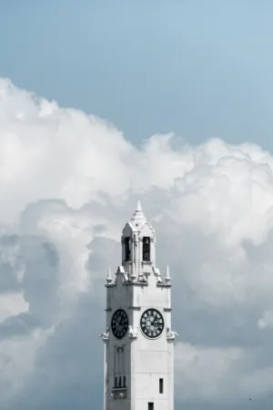 Clock Tower Against Cloudy Sky