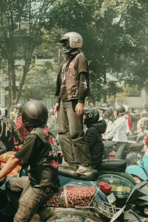 Motorcycle Rider In Crowd