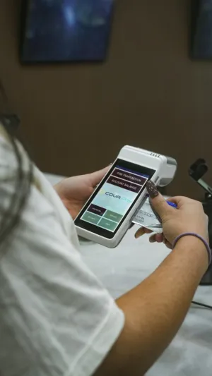 Person Using Payment Terminal