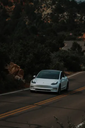 Tesla Model 3 On A Mountain Road