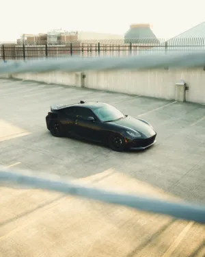 Black Sports Car In Parking Garage