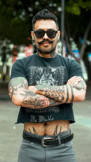 Tattooed Man In Urban Setting