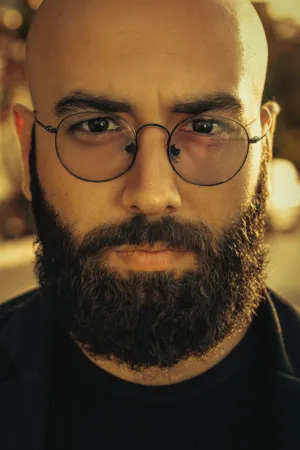 Bald Man With Beard And Glasses