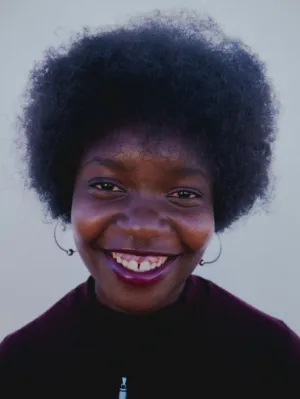 Smiling Woman With Afro