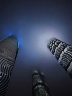 Modern Skyscrapers In The Mist