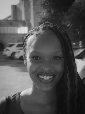 Smiling Woman With Braids