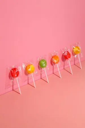 Colorful Lollipops On Pink Background