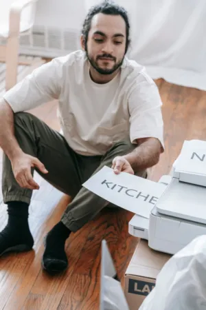 Man Organizing Kitchen Items