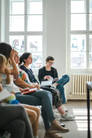 Group Of People In A Classroom Setting