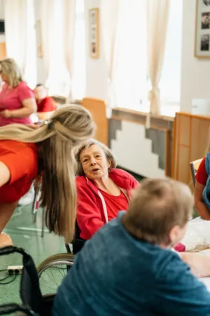 Group Of People In A Room