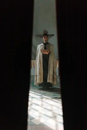 Priest In Church