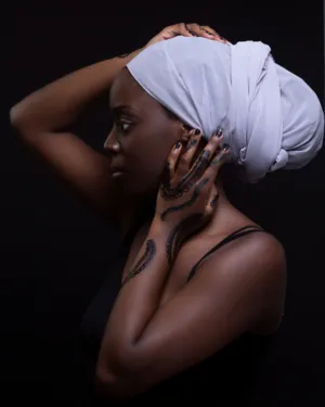 Tattooed Woman In Headwrap