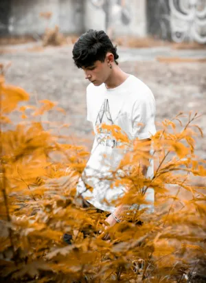 Teenager In White T-Shirt
