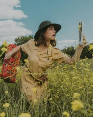 Vintage Traveler In A Field