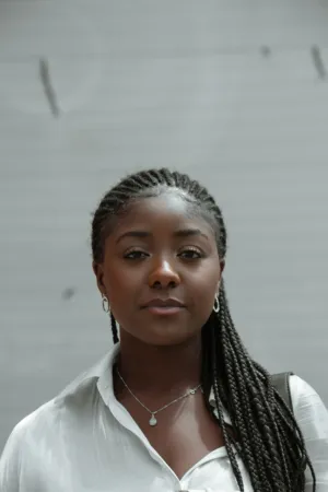Portrait Of A Woman With Braids