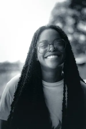 Smiling Woman With Braids
