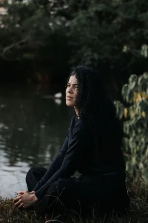 Contemplative Moment By The Water