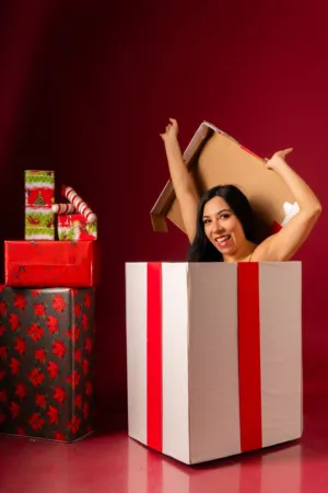 Woman Emerging From Gift Box