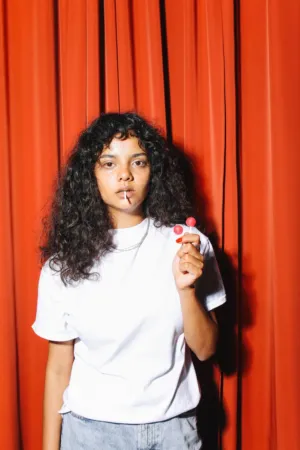 Portrait Of A Woman With A Lollipop