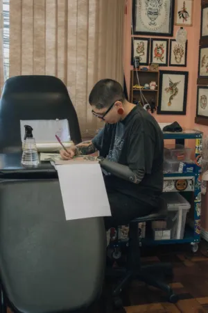 Tattoo Artist Sketching