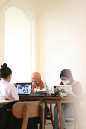 Students Studying In A Library