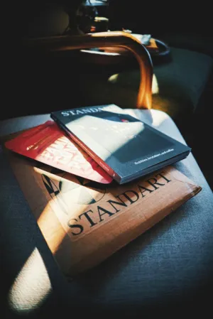 Book And Envelope On Chair