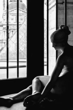 Nude Statue By Window