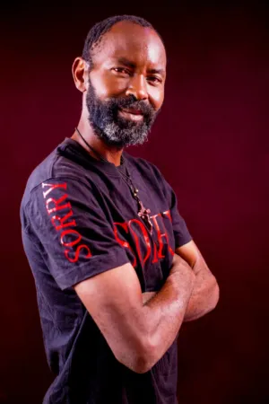 Man In Black T-Shirt With Red Text