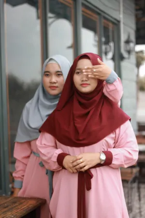 Two Women In Traditional Attire