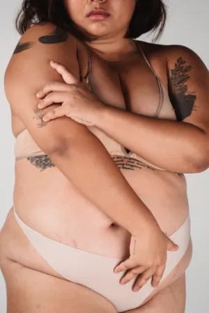 Plus Size Model In Nude Lingerie