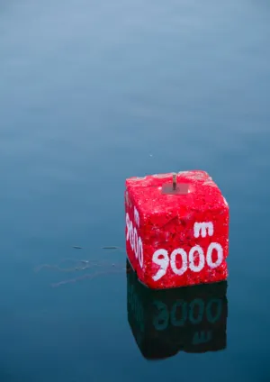 Red Buoy With '9000'
